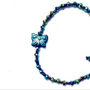 Handmade Iridescent Black Blue Butterfly Bracelet  McGlamorous